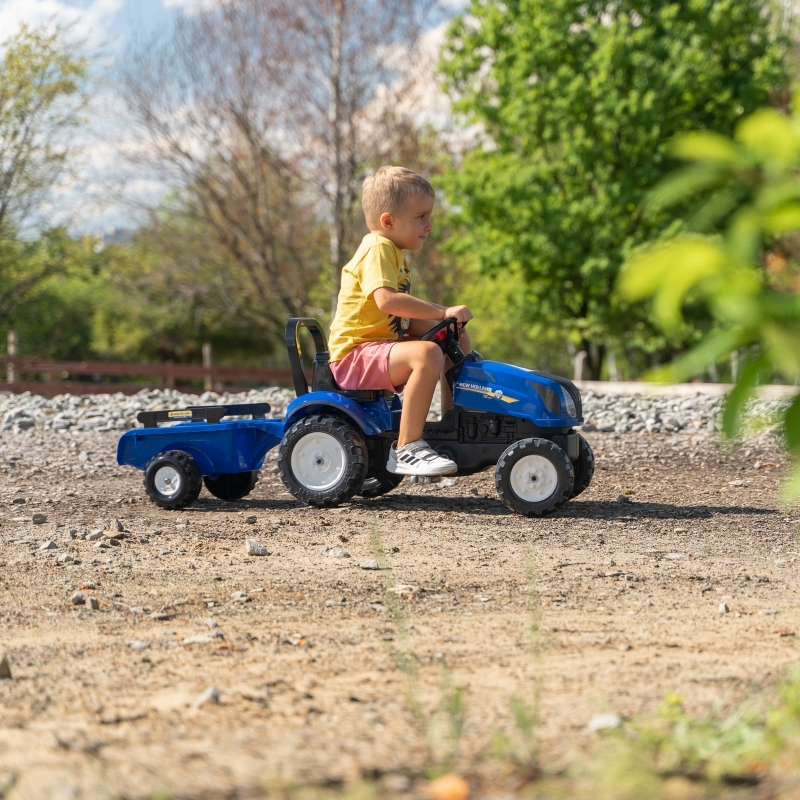 Falk pedaaltraktor koos haagisega New Holland